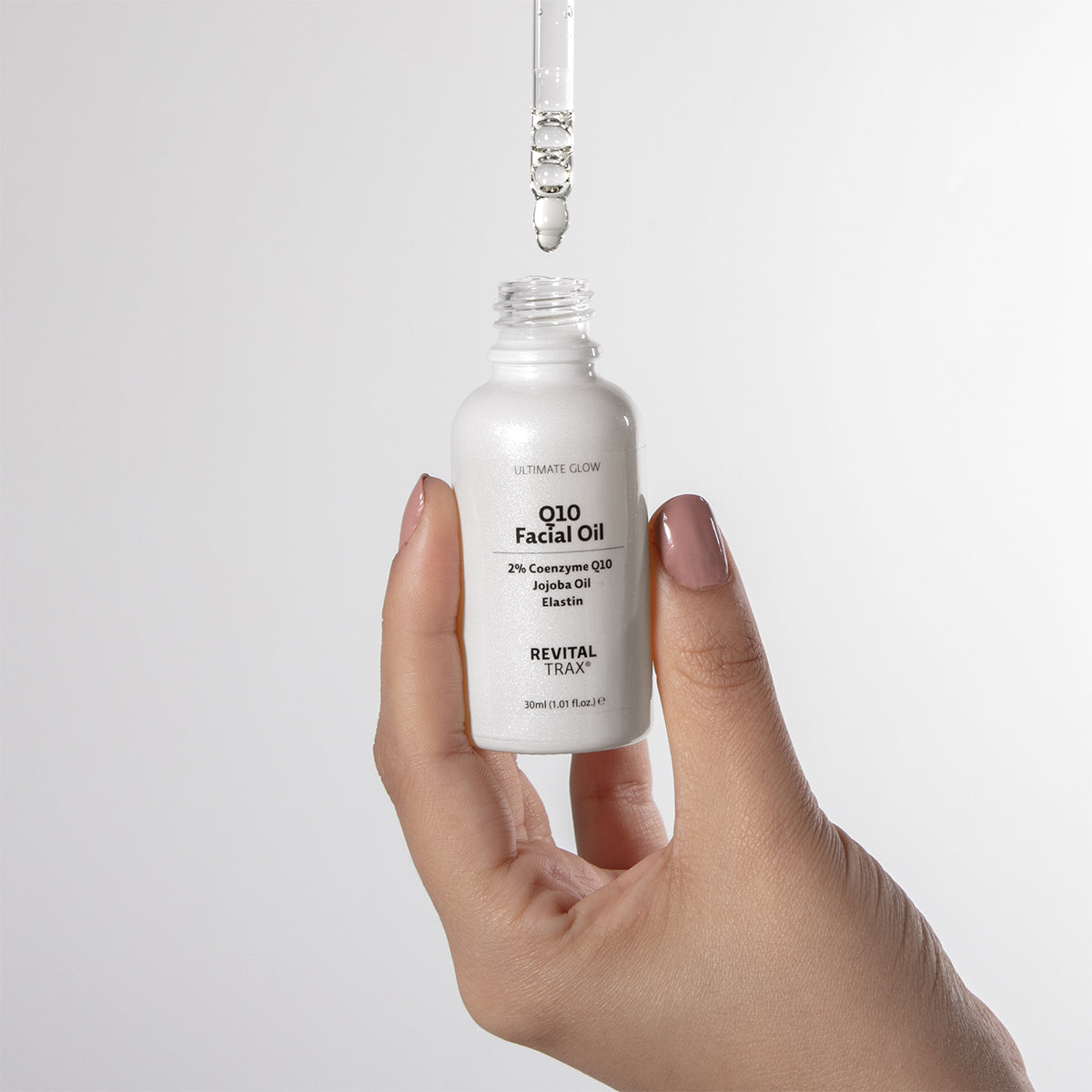 Aceite facial Ultimate Glow con 2% de Q10